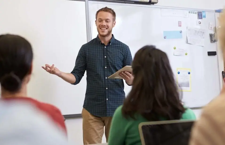 teacher during class teaching his students